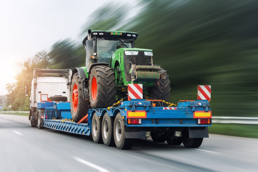 machinery towing on the road